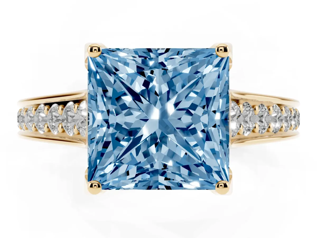 Fancy Blue Princess Cut Brilliant Cut Diamond Engagement Ring with Pavé Band and Four-Prong Setting Yellow gold