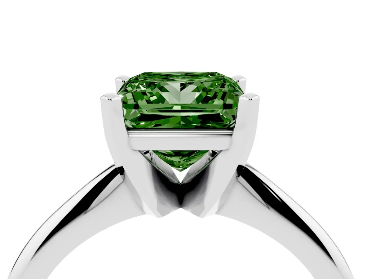 Fancy Green Princess Cut Cut Solitaire Ring with Four-Prong Setting on a Classic Band Silver