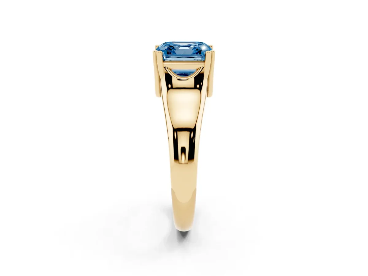Fancy Blue Asscher Cut Diamond Solitaire Ring with Wide Band and Prong Setting Yellow gold