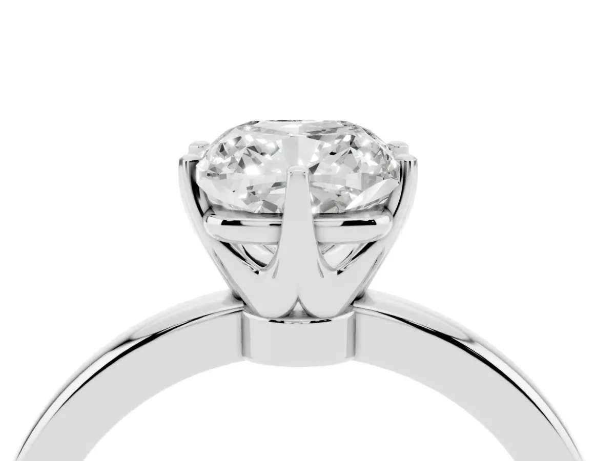 Cushion Cut Solitaire Diamond Ring with Six-Prong Setting on a Classic Band Platinum