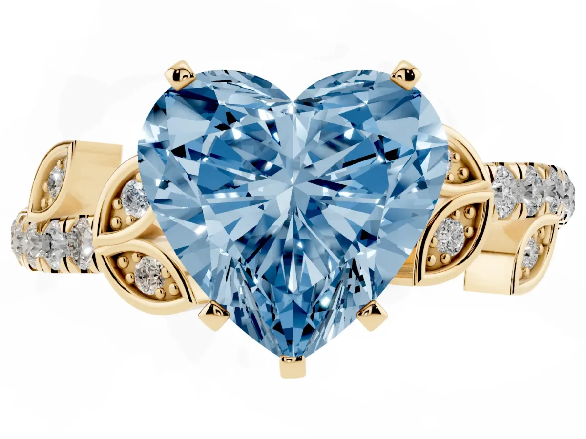 Fancy Blue Heart Cut Solitaire Leaf-Inspired Diamond Ring with Pavé Band and Four-Prong Setting Yellow gold