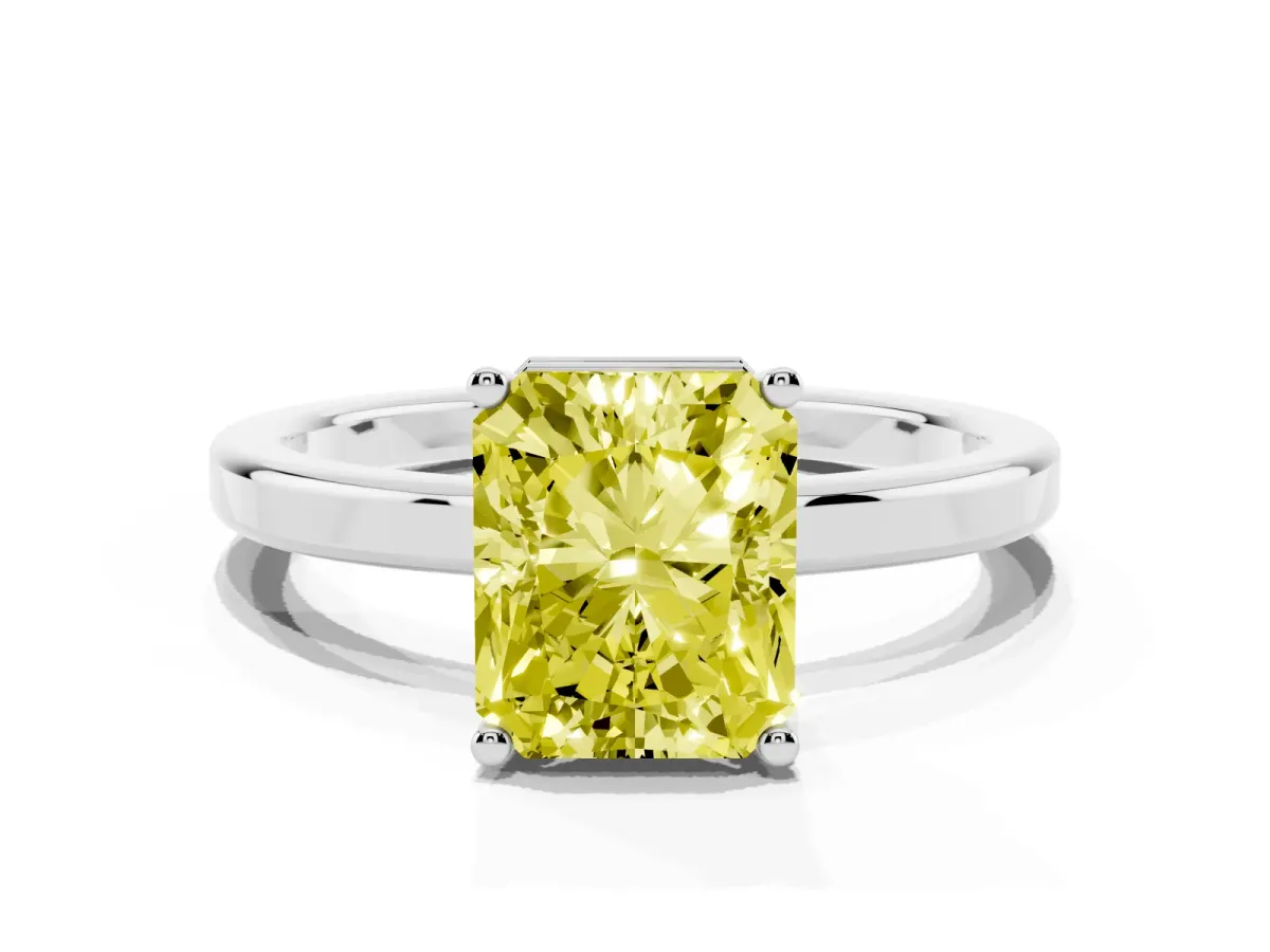 Fancy Yellow Radiant Cut Cut Solitaire Engagement Ring with Four-Prong Setting on a Classic Band Silver