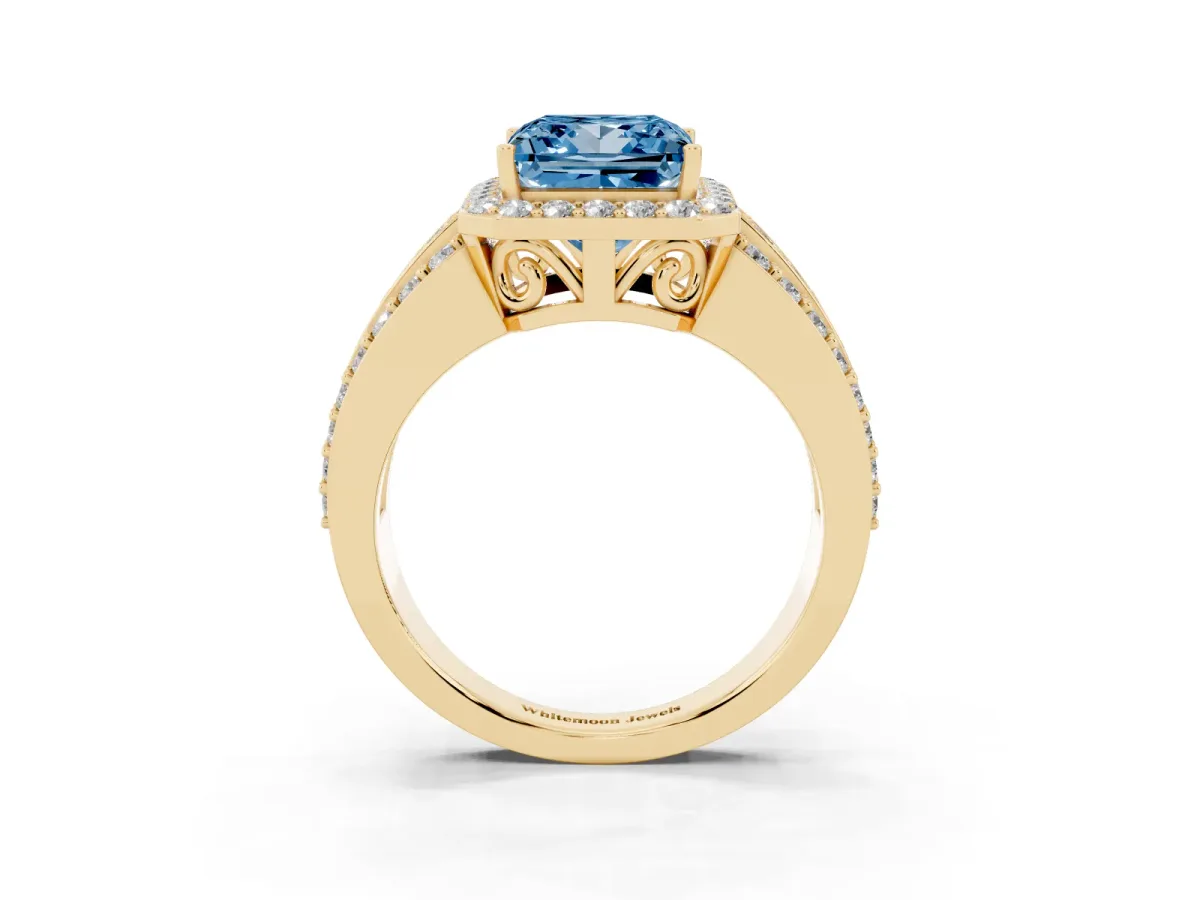 Fancy Blue Princess Cut Halo Diamond Ring with Round Split Shank and Prong Setting Yellow gold