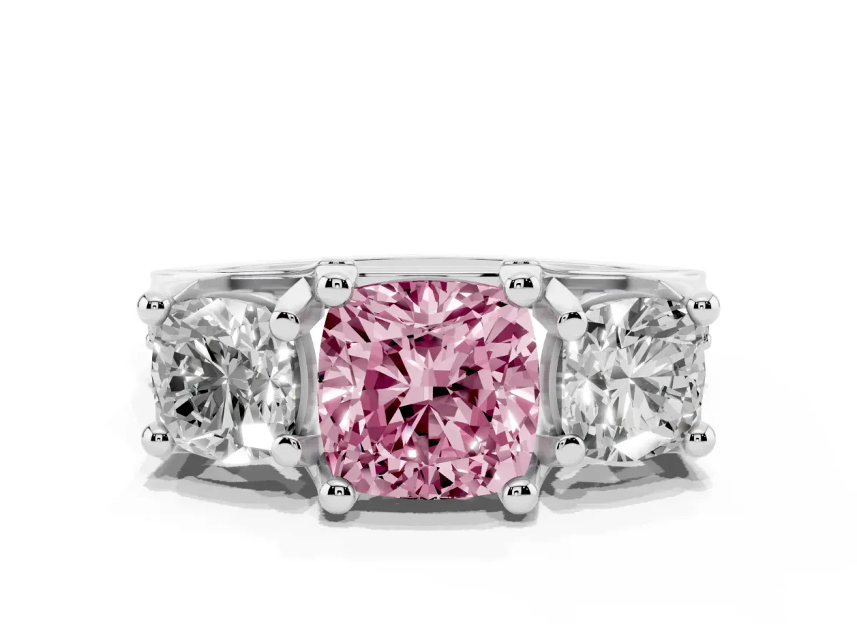 Fancy Pink Cushion Cut Diamond Three-Stone Ring with Channel Set Band and Four-Prong Setting Platinum