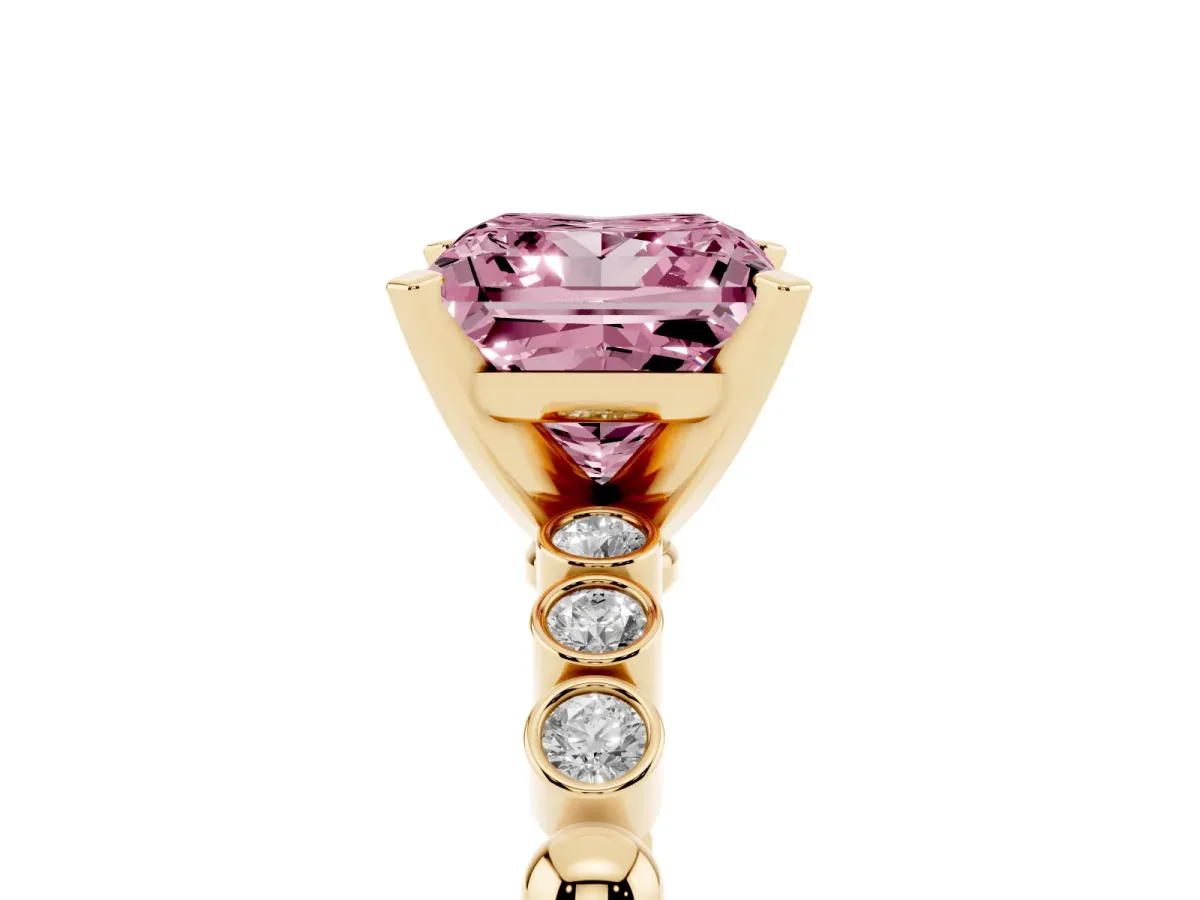 Fancy Pink Princess Cut Solitaire Bezel Accent Diamond Engagement Ring with Beaded Band and Four-Prong Setting Yellow gold