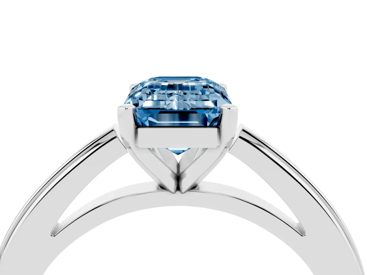 Fancy Blue Emerald Cut Solitaire Diamond Ring with Four-Prong Setting and Classic Band Platinum
