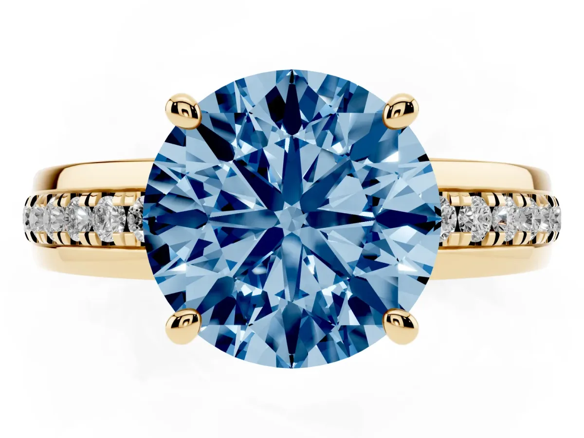 Fancy Blue Round Cut Solitaire Diamond Ring with Channel Set Band and Six-Prong Setting Yellow gold