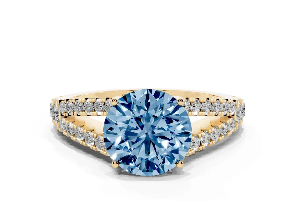 Fancy Blue Round Cut Diamond Split Shank Engagement Ring with Round Pavé and Prong Setting Yellow gold