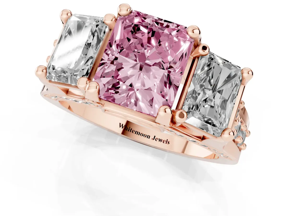 Fancy Pink Radiant Cut Diamond Three-Stone Ring with Channel Set Band and Four-Prong Setting Rose gold