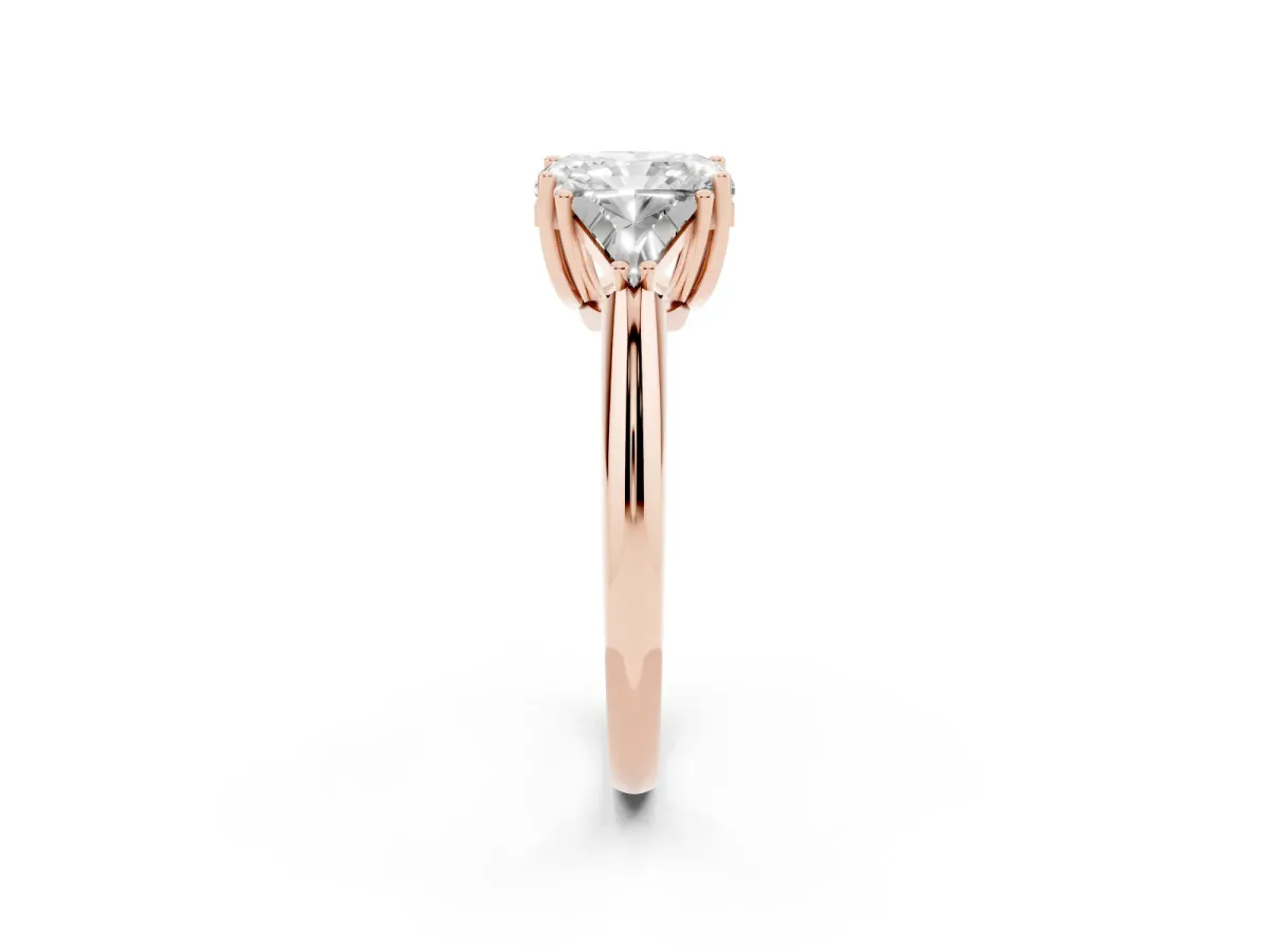 Three-Stone Radiant Cut Diamond Engagement Ring with Trillion Side Stones and Prong Setting Rose gold