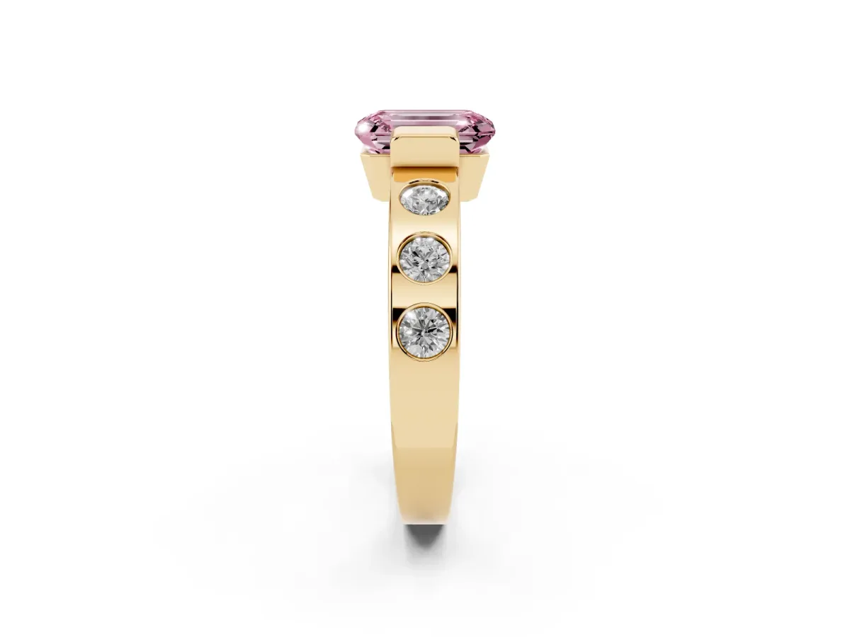Fancy Pink Emerald Cut Brilliant Channel-Set Diamond Ring with Bezel Prong Setting Yellow gold