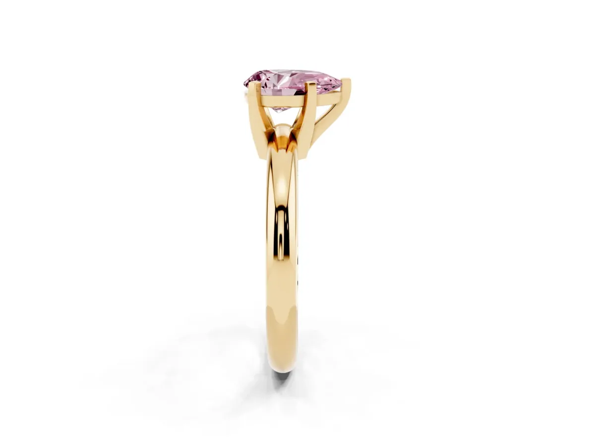 Fancy Pink Pear Cut Diamond Solitaire Engagement Ring with Round Band and Four-Prong Setting Yellow gold