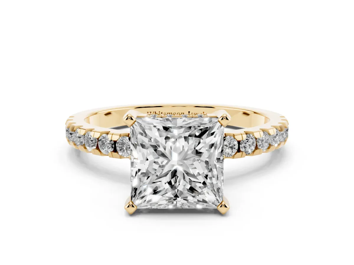 Princess Cut Diamond Solitaire Ring with Round Pavé Band and Four-Prong Setting Yellow gold