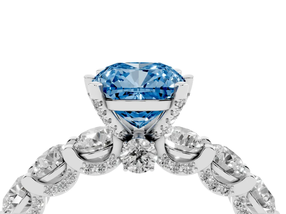Fancy Blue Cushion Cut Diamond Side Stone Engagement Ring with Four-Prong Setting Platinum