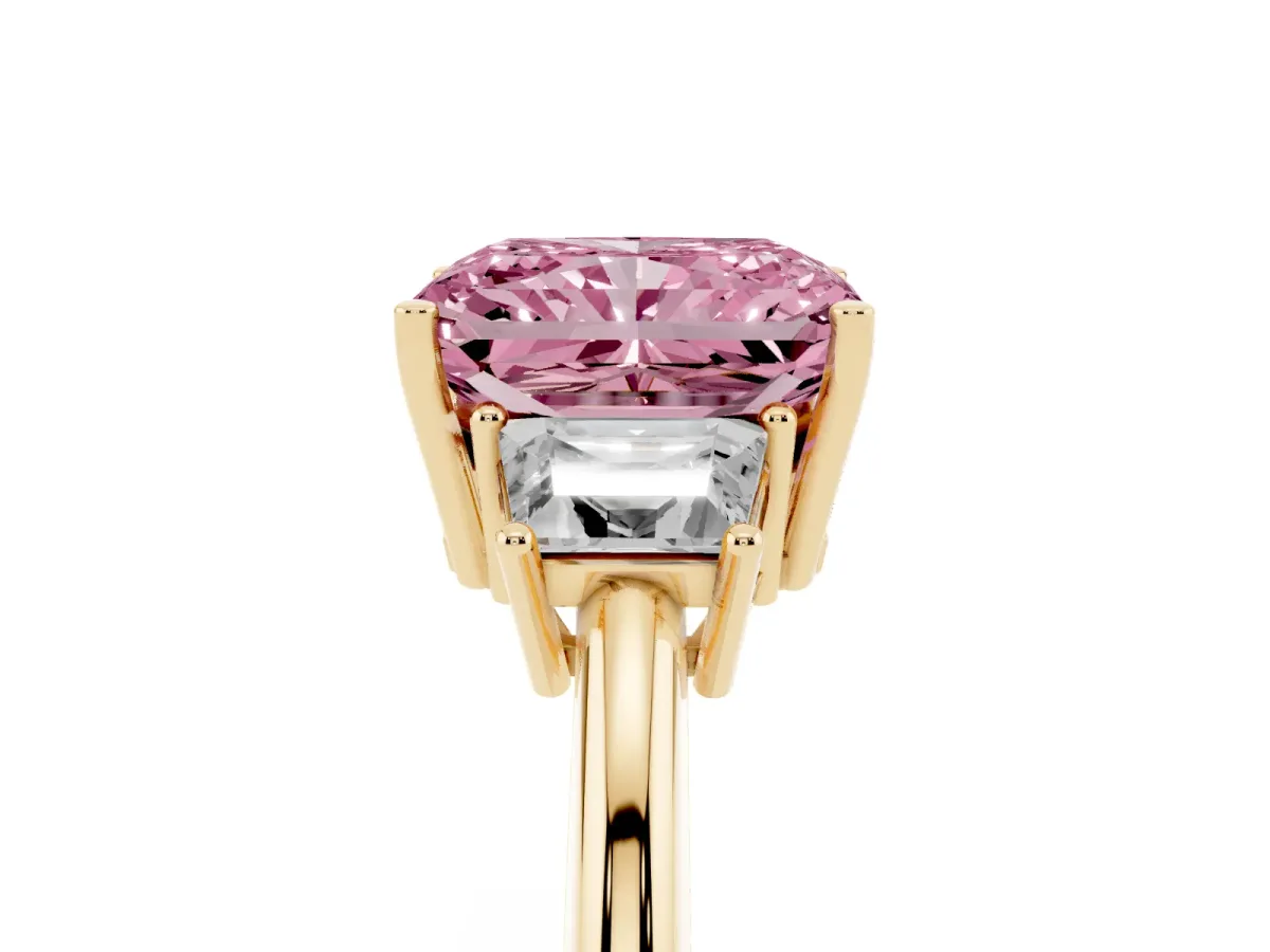 Fancy Pink Radiant Cut Diamond Three-Stone Ring with Trapezoid Side Stones and Prong Setting Yellow gold