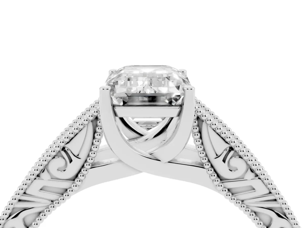 Emerald Cut Diamond Solitaire Ring with Engraved Band and Four-Prong Setting Platinum