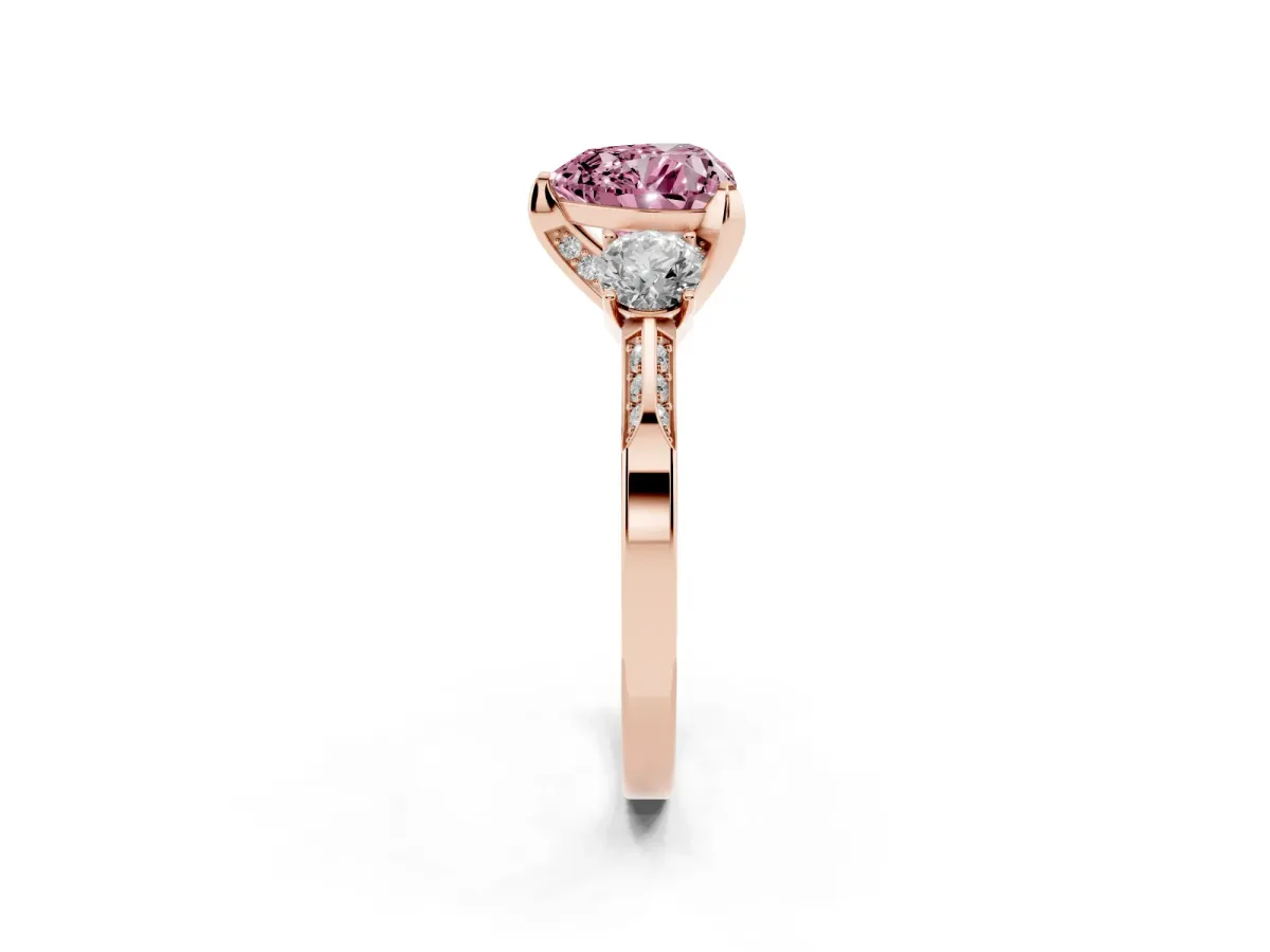 Fancy Pink Heart Cut Brilliant Three-Stone Diamond Ring with Pavé Band and Four-Prong Setting Rose gold