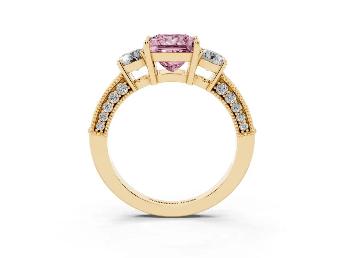 Fancy Pink Princess Cut Three-Stone Diamond Ring with Pavé Band and Four-Prong Setting Yellow gold