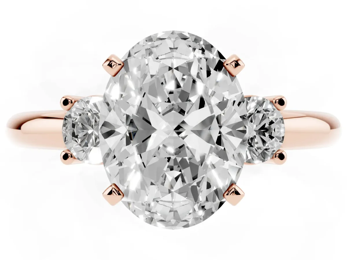 Three-Stone Oval Cut Cut Diamond Solitaire with Prong Setting and Classic Band Rose gold