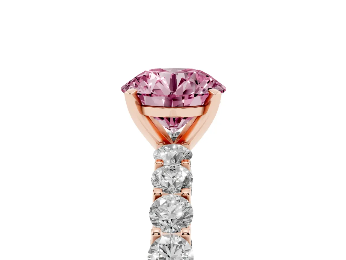 Fancy Pink Round Cut Diamond Solitaire Ring with Shared Prong Pavé Band and Four-Prong Setting Rose gold