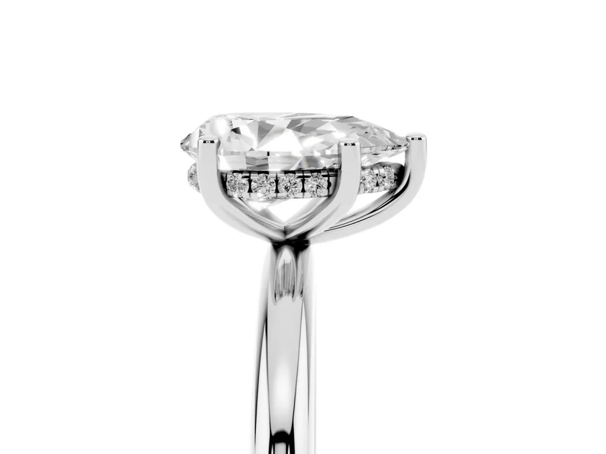 Pear Cut Cut Solitaire Engagement Ring with Four-Prong Setting and Classic Band Silver
