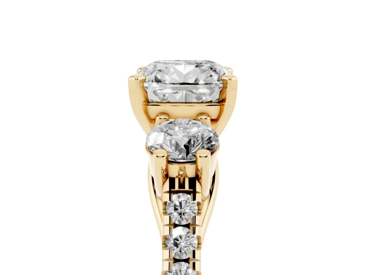 Three-Stone Cushion Cut Diamond Pavé Band with Four-Prong Setting Yellow gold