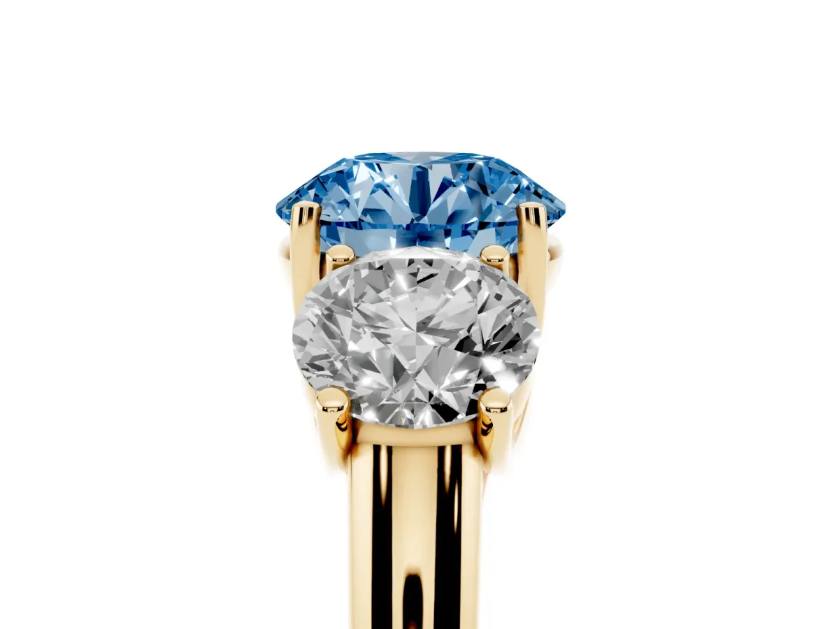 Fancy Blue Three-Stone Round Cut Diamond Engagement Ring with Prong Setting Yellow gold