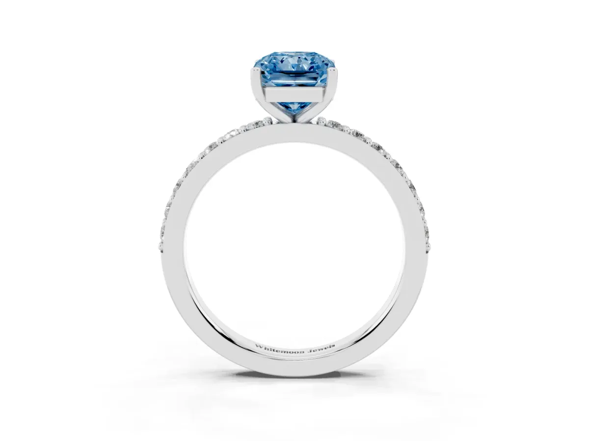 Fancy Blue Radiant Cut Cut Diamond Solitaire with Pave Band and Four-Prong Setting Silver