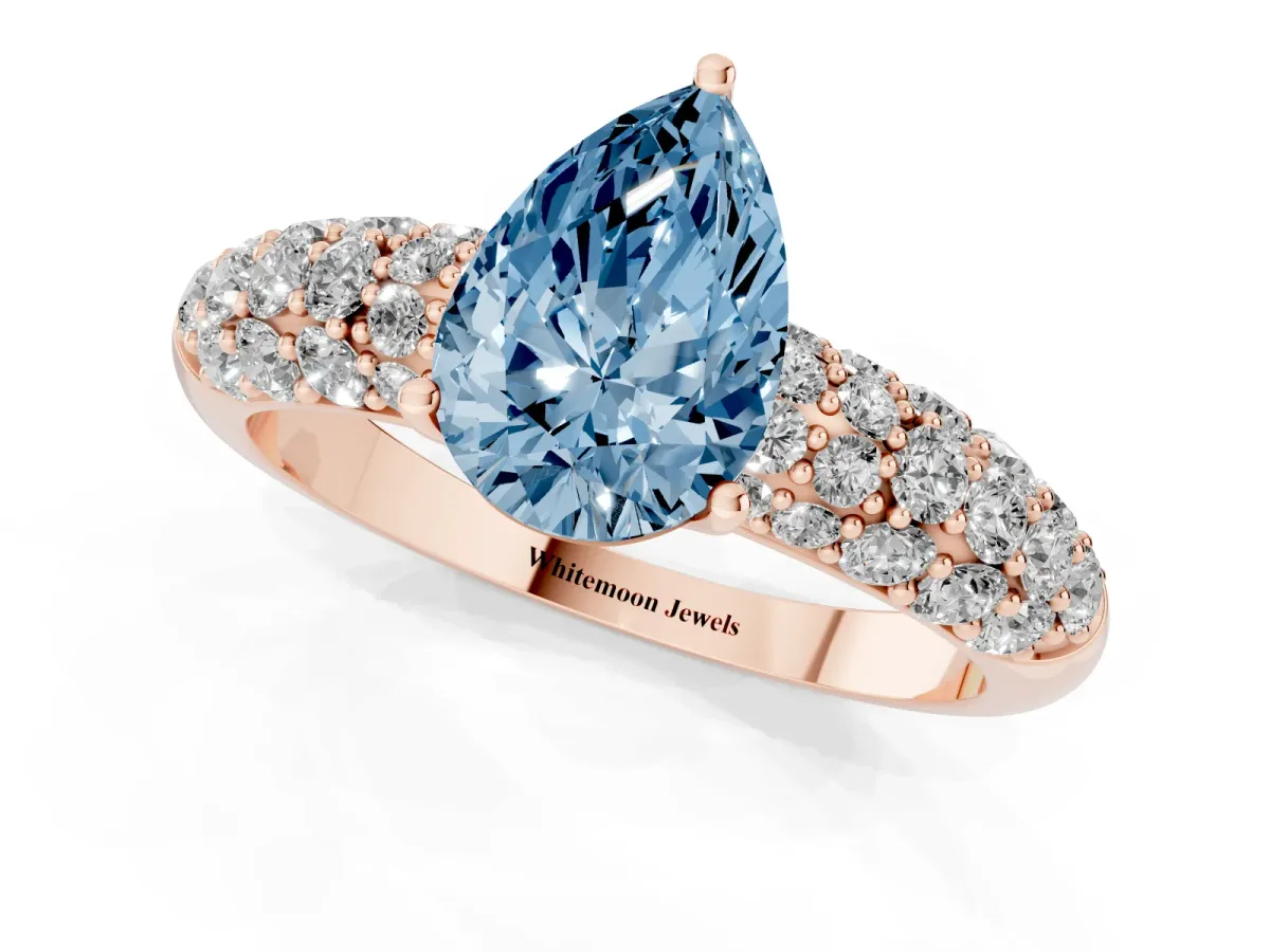 Fancy Blue Pear Cut Diamond Pavé Band Solitaire Ring with Four-Prong Setting Rose gold