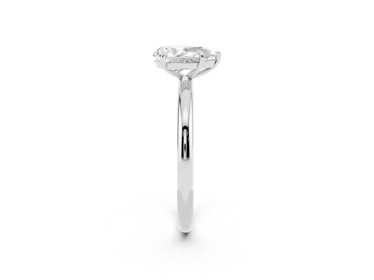 Pear Cut Solitaire Diamond Ring with Four-Prong Setting on a Plain Band Silver