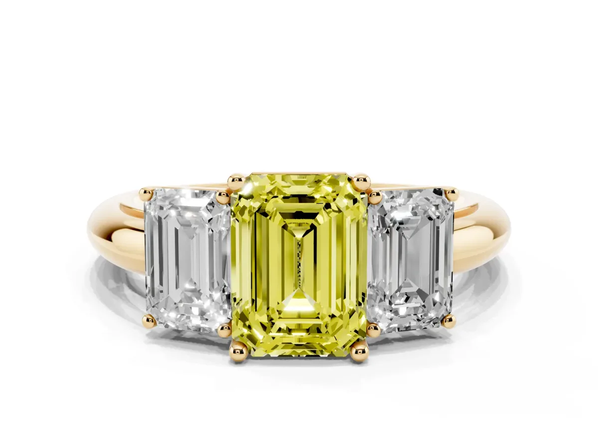 Fancy Yellow Three-Stone Emerald Cut Cut Diamond Engagement Ring with Prong Setting on a White Gold Band Yellow gold