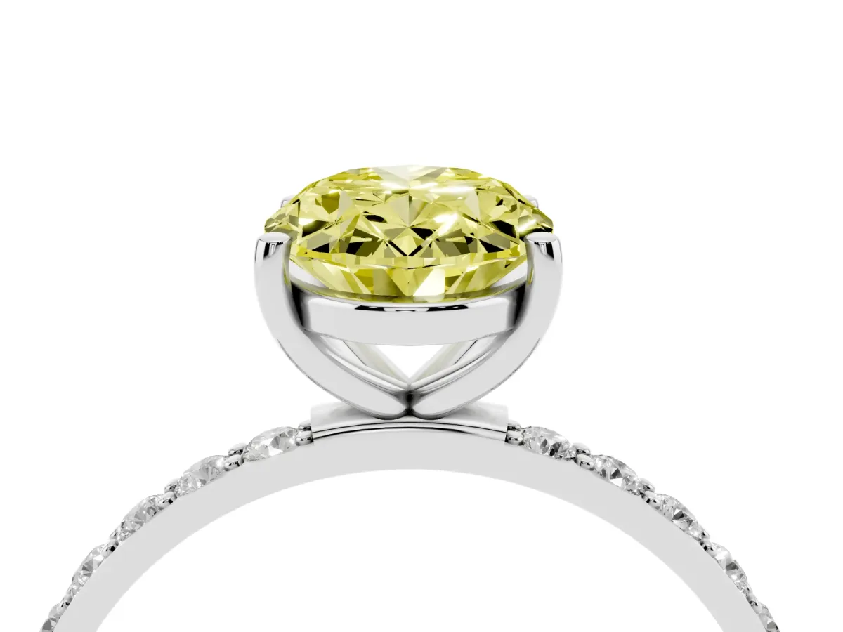 Fancy Yellow Oval Cut Diamond Solitaire Ring with Round Pavé Shoulders and Prong Setting Silver