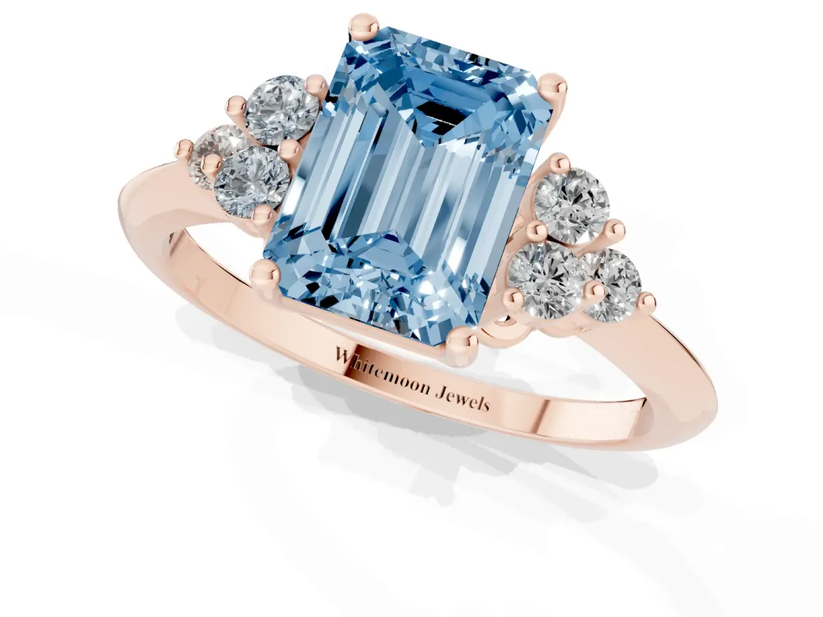 Fancy Blue Emerald Cut Cut Diamond Cluster Ring with Solitaire Band and Four-Prong Setting Rose gold