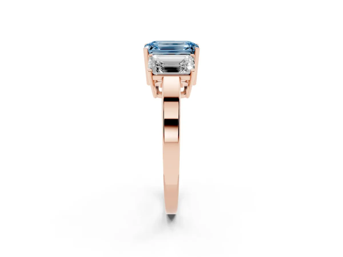 Fancy Blue Three-Stone Emerald Cut Cut Diamond Engagement Ring with Flat Band and Four-Prong Setting Rose gold