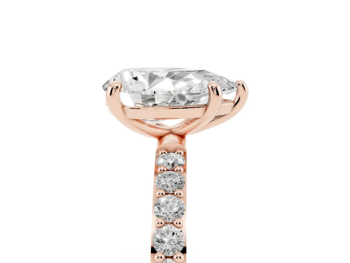 Pear Cut Diamond Solitaire Ring with Round Pavé Band and Prong Setting Rose gold
