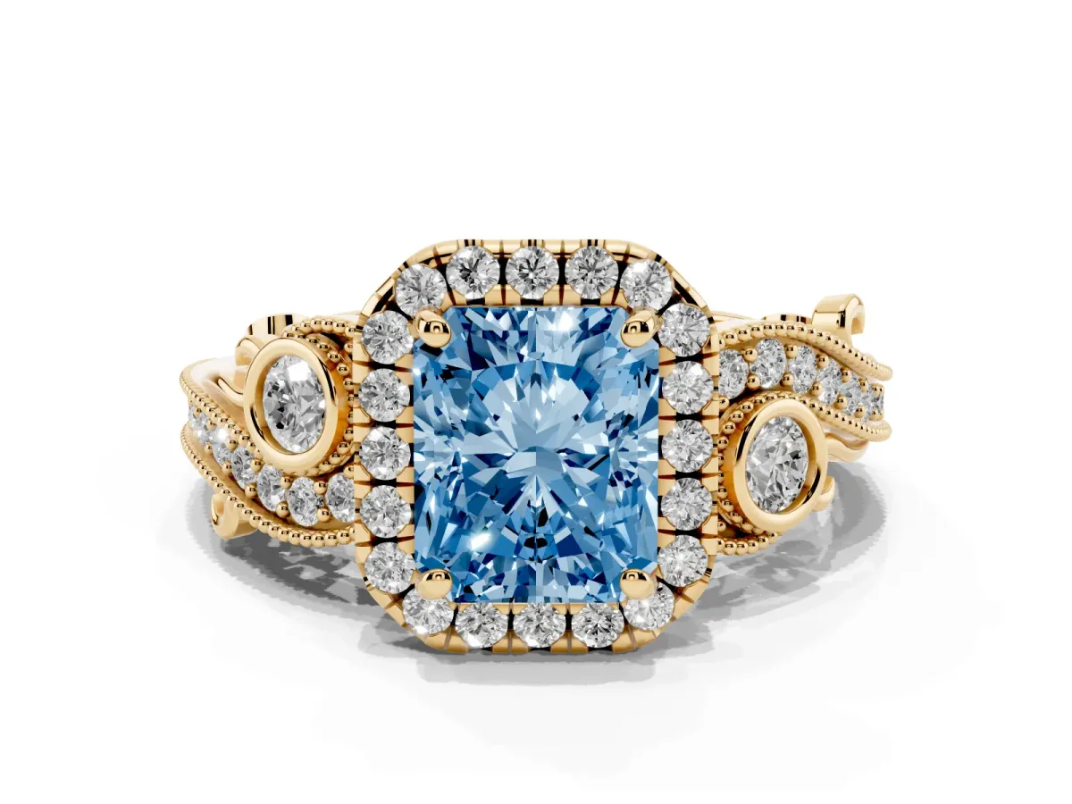 Fancy Blue Radiant Cut Halo Diamond Ring with Milgrain and Bezel Accents on a Split Shank Band Yellow gold