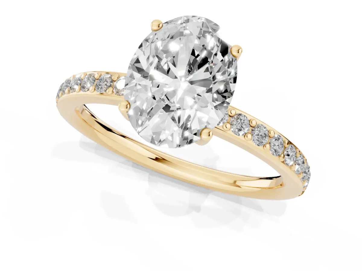 Oval Cut Cut Diamond Pavé Band Ring with Four-Prong Setting Yellow gold