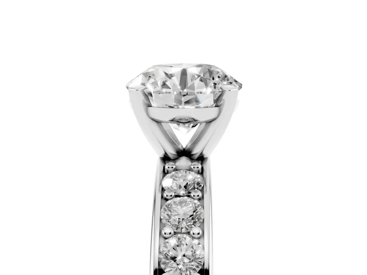 Round Cut Diamond Engagement Ring with Channel Set Round Band and Prong Setting Silver