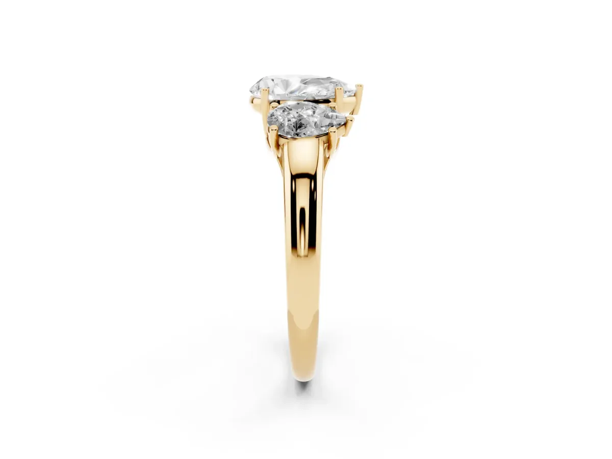 Three-Stone Pear Cut Diamond Engagement Ring with Prong Setting Yellow gold