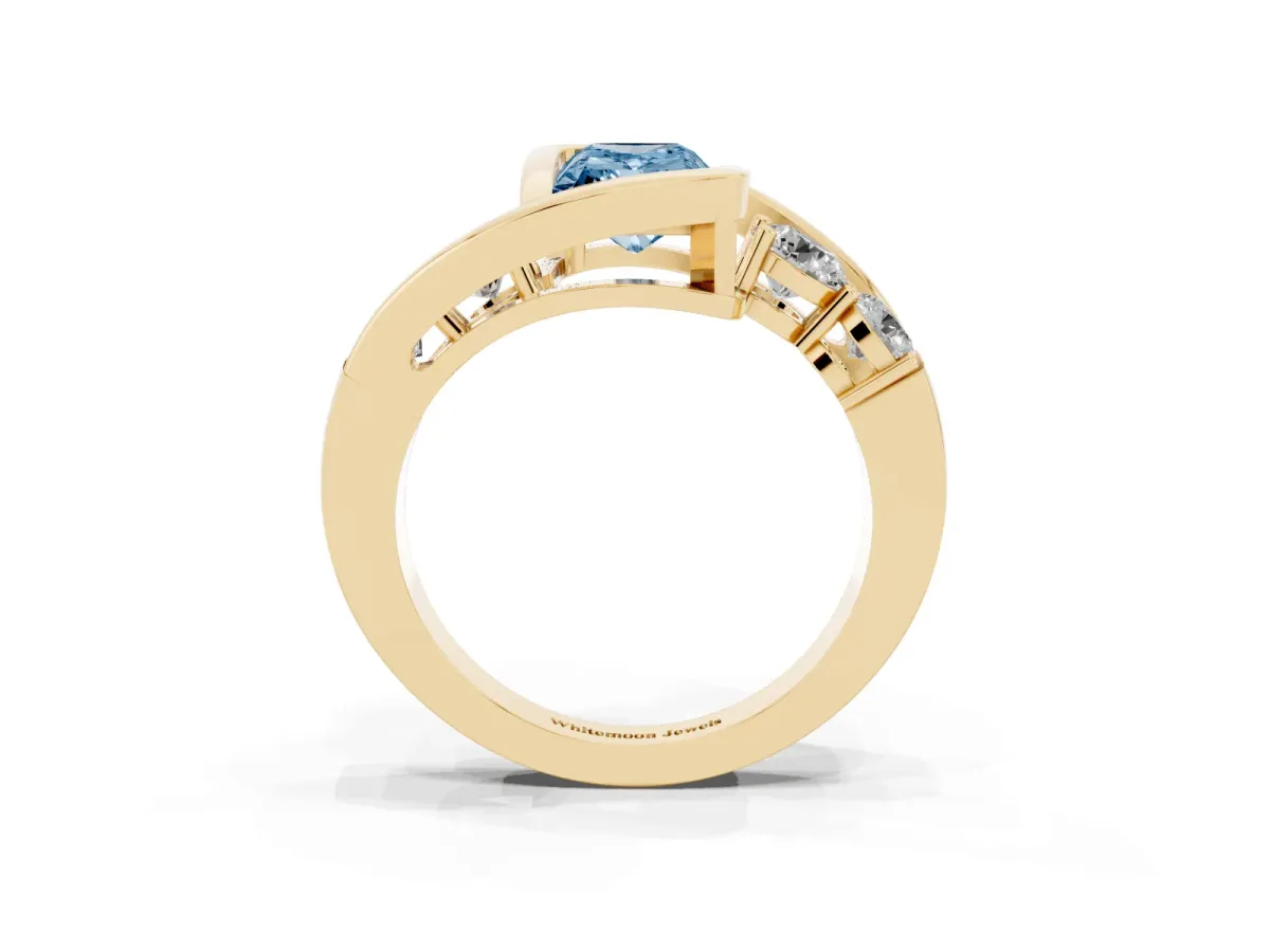 Fancy Blue Bezel Set Radiant Cut Diamond Bypass Ring with Round Accents Yellow gold