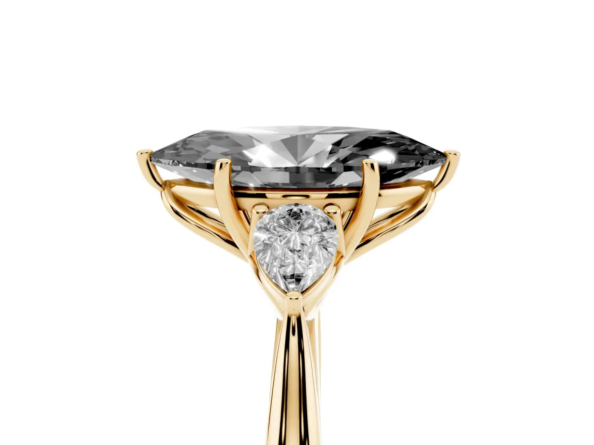 Fancy Black Three-Stone Marquise Cut Brilliant Diamond Solitaire Ring with Tapered Band and Four-Prong Setting Yellow gold