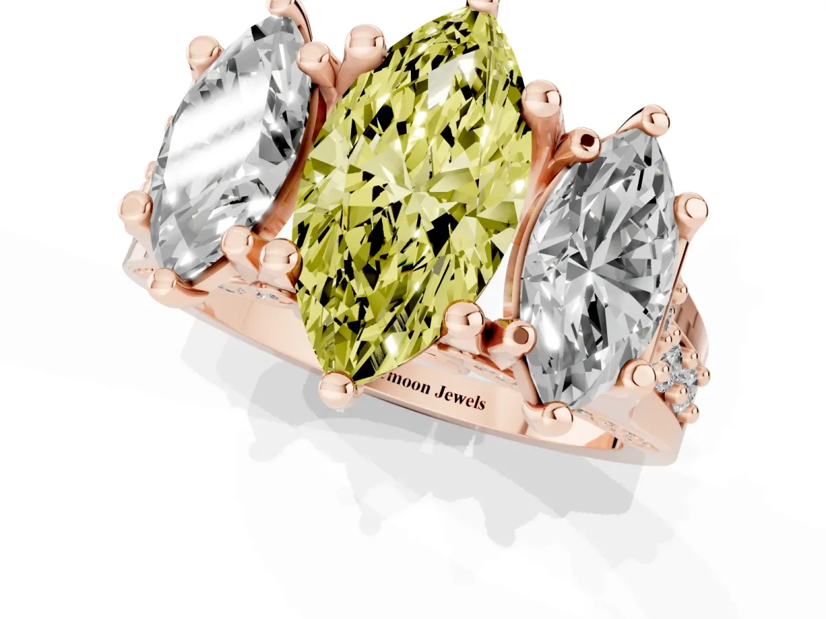 Fancy Yellow Marquise Cut Diamond Three-Stone Ring with Channel Set Band and Four-Prong Setting Rose gold