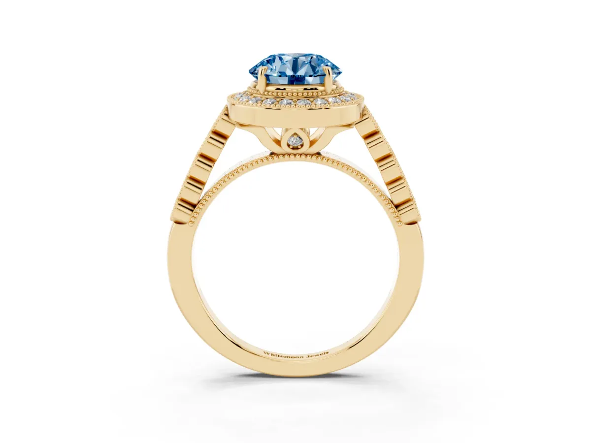 Fancy Blue Round Cut Halo Milgrain Solitaire with Bezel Set Side Stones and Pave Band Yellow gold