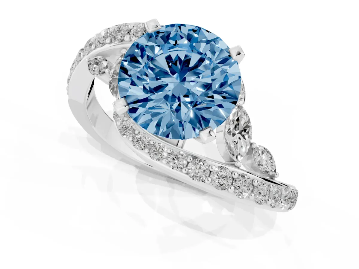 Fancy Blue Round Cut Solitaire with Pavé Twist Band and Four-Prong Setting Silver