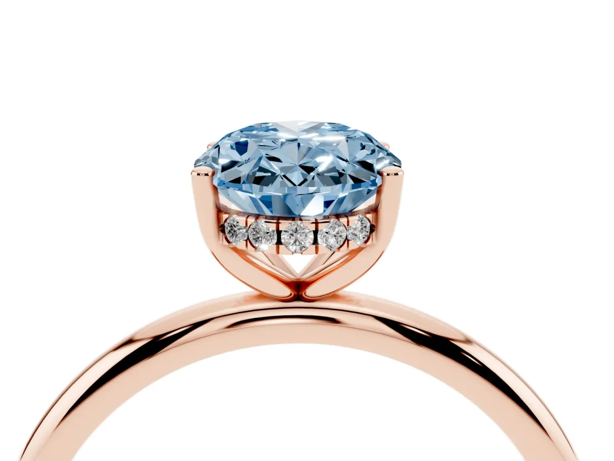 Fancy Blue Oval Cut Cut Solitaire Engagement Ring with Four-Prong Setting and Classic Band Rose gold