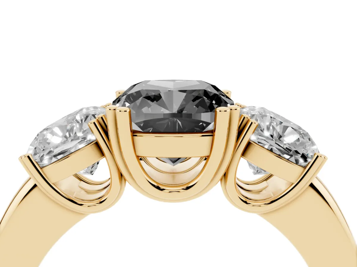 Fancy Black Three-Stone Cushion Cut Cut Diamond Ring with Channel Set Band and Four-Prong Setting Yellow gold