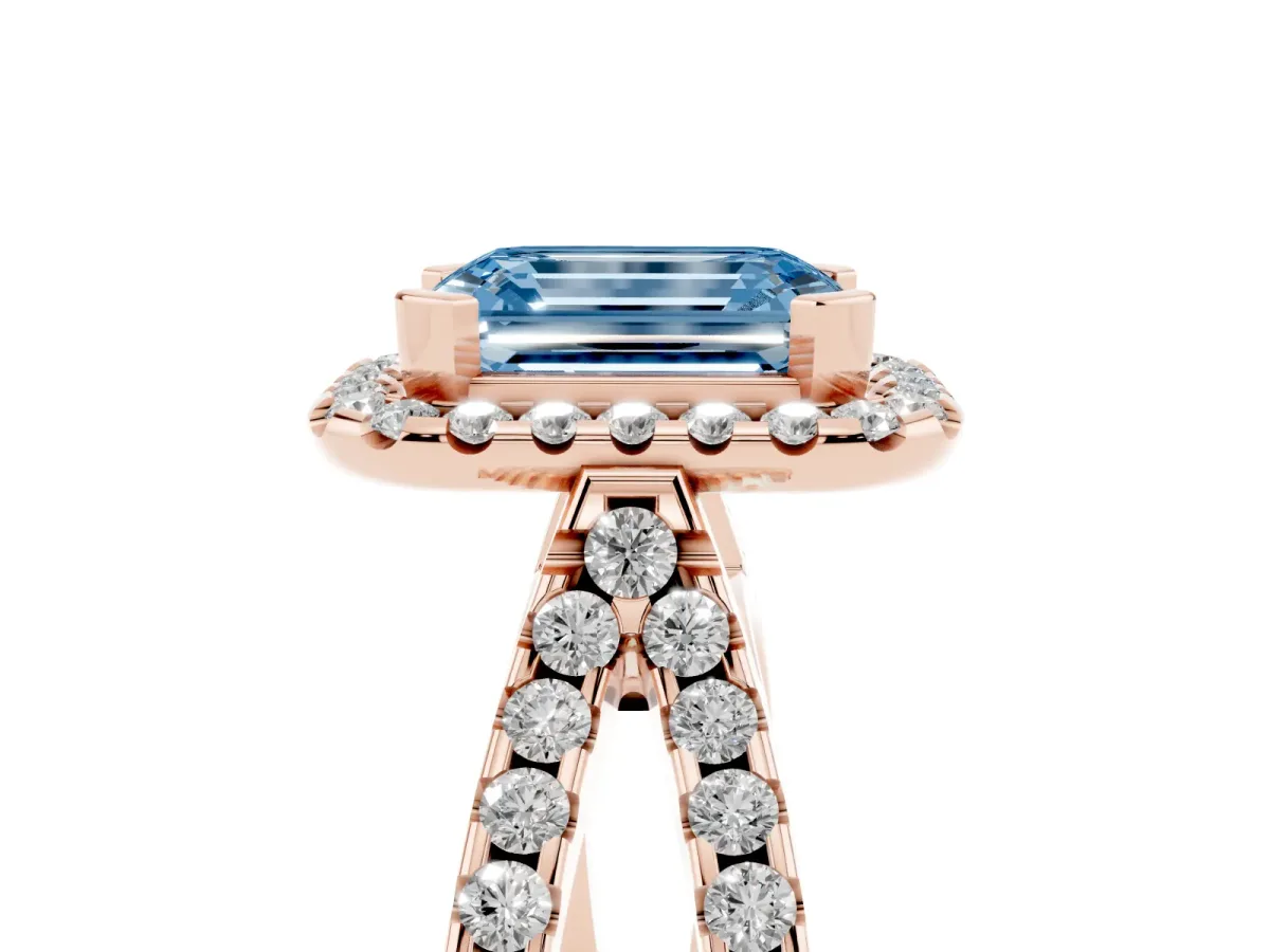 Fancy Blue Emerald Cut Diamond Halo Ring with Split Shank Pavé Band and Prong Setting Rose gold