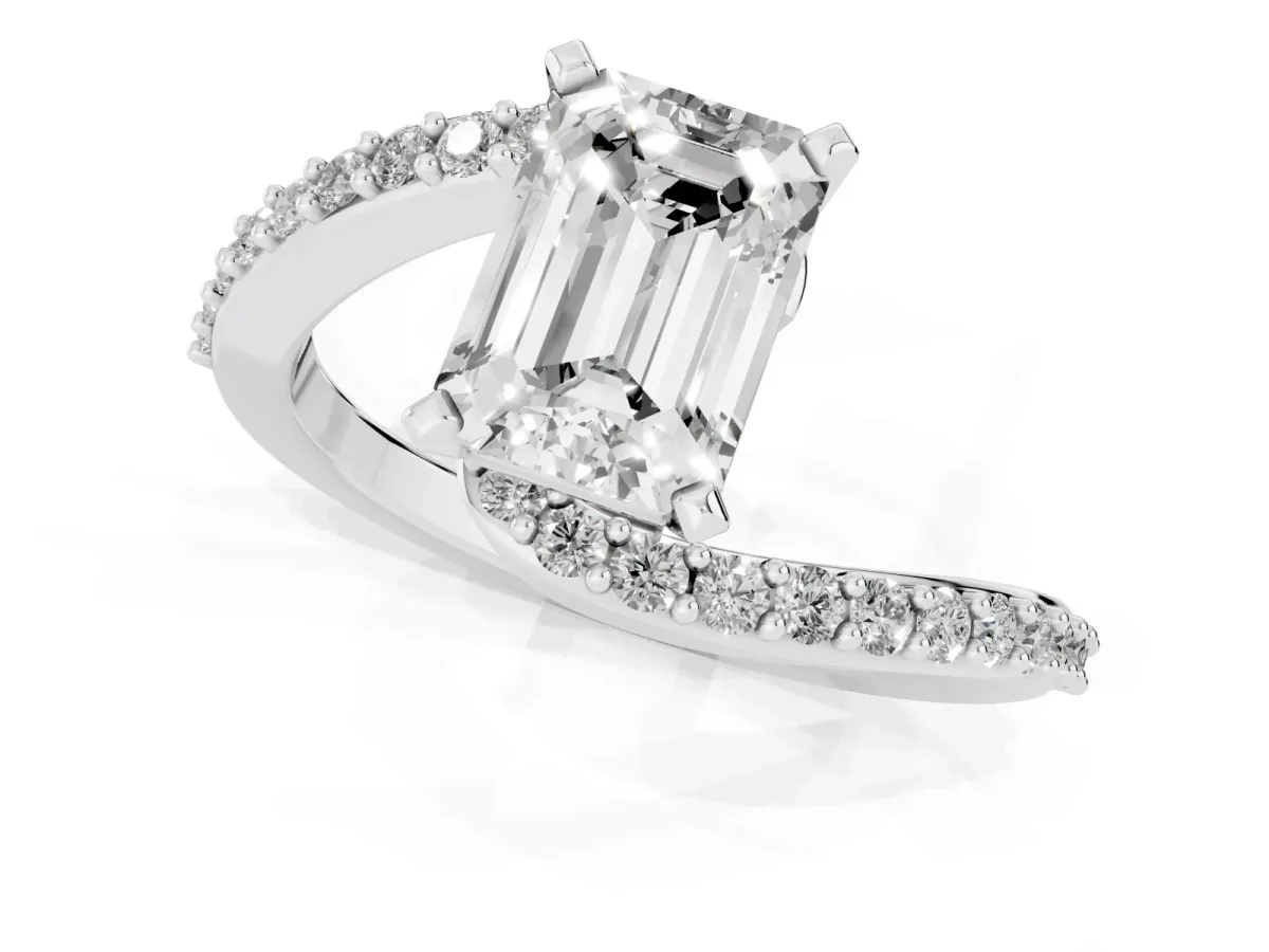 Emerald Cut Solitaire Twist Band with Pave Set Diamonds and Four-Prong Setting Silver