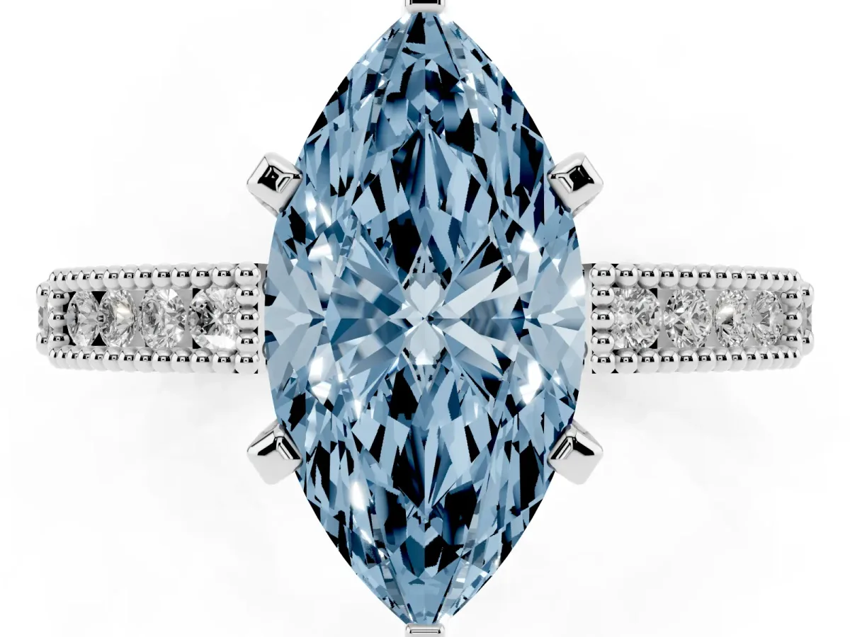 Fancy Blue Marquise Cut Solitaire with Pavé Band and Four-Prong Setting Silver