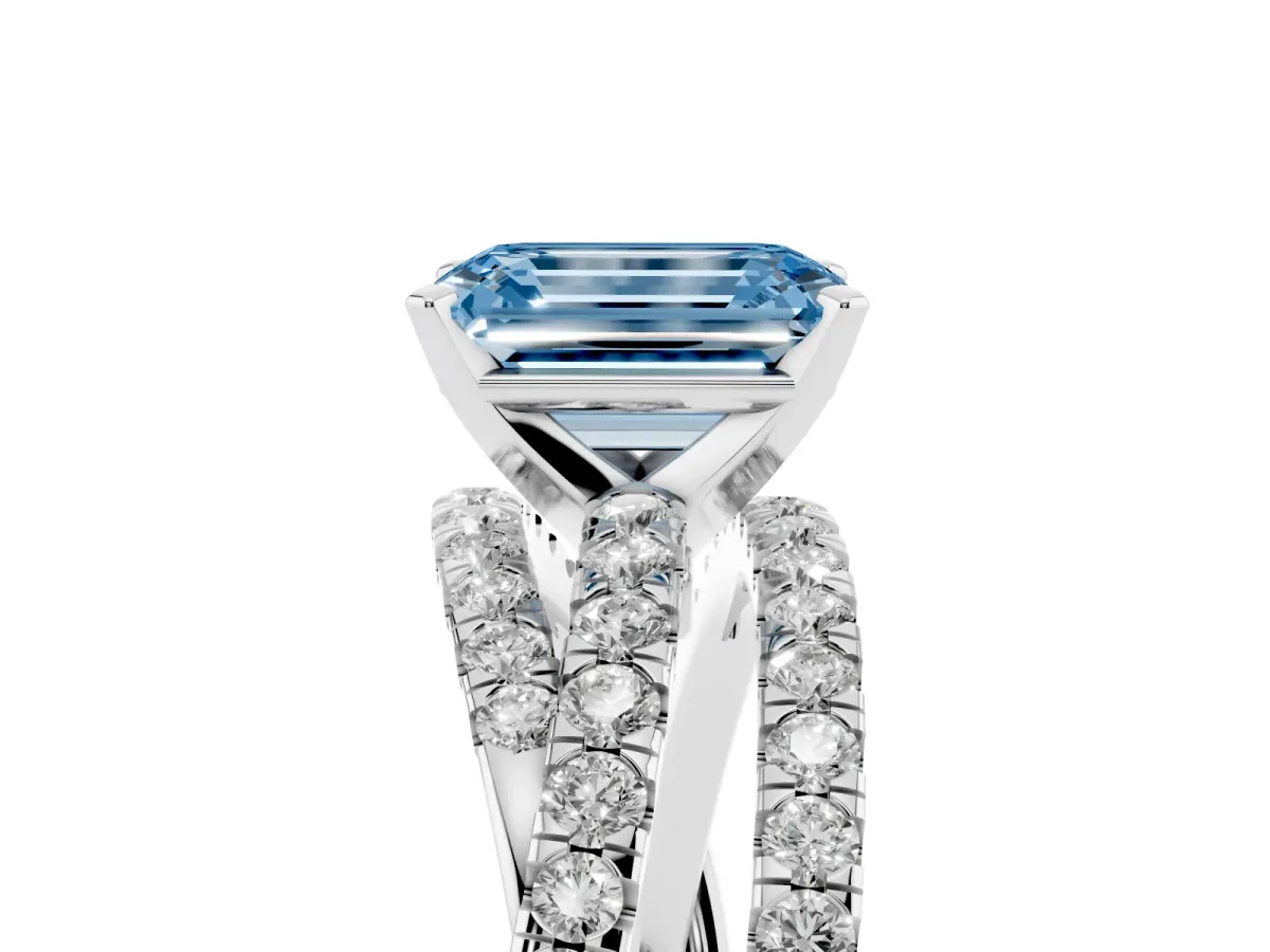 Fancy Blue Emerald Cut Solitaire Twist Band with Pavé Setting and Four-Prong Setting Silver